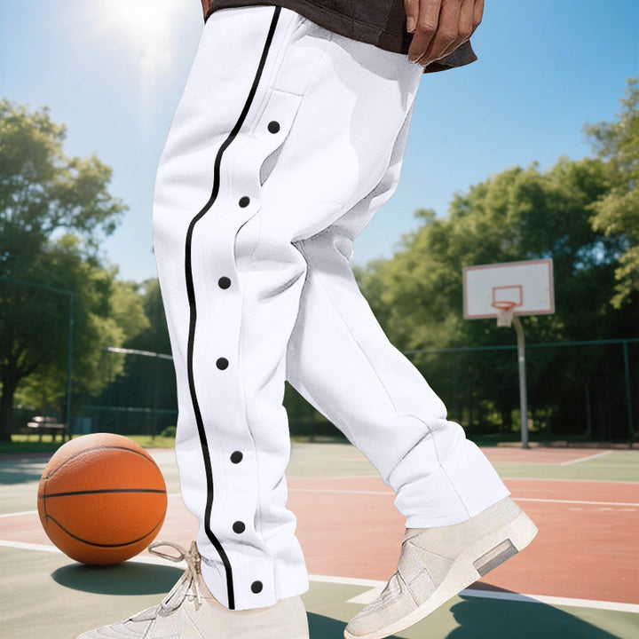Men's wide training pants with side snap button placket, contrast stripes, elastic waistband, and straight leg StylebySassy