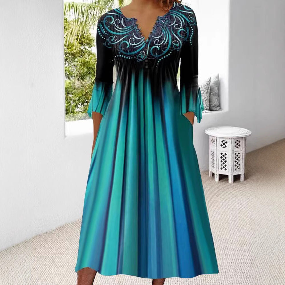 Women's flowing maxi dress with embellished V-neck, underbust seam, flared skirt and side pockets StylebySassy