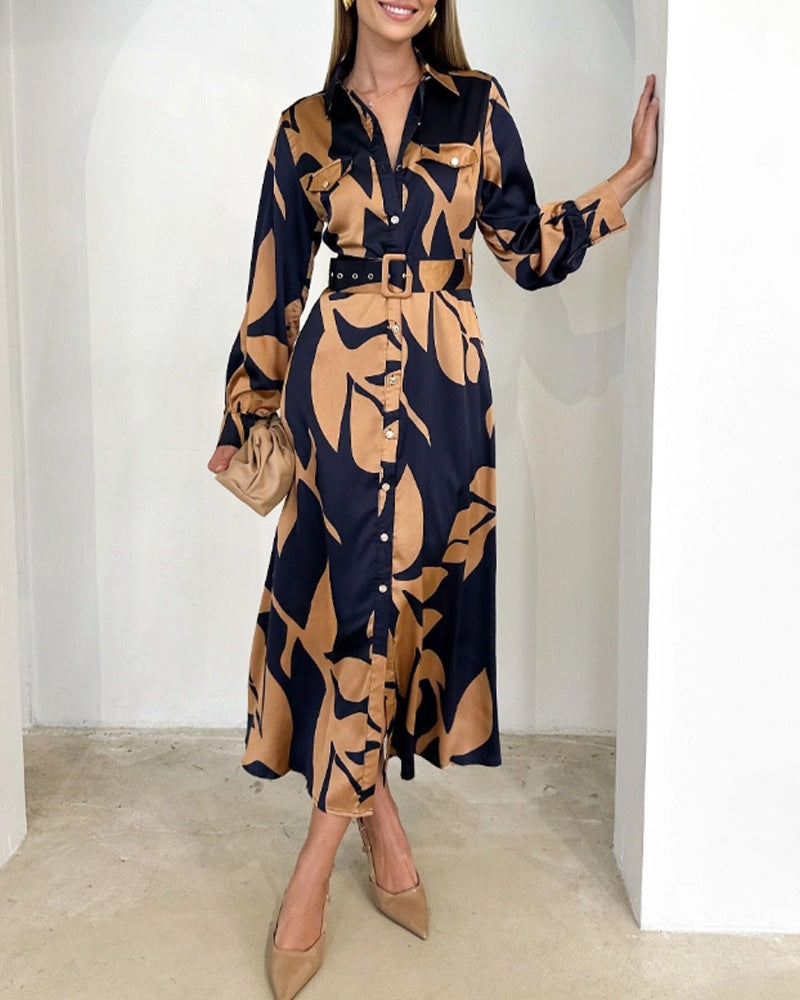 Women flowing shirt dress with waist belt, breast flaps and abstract print StylebySassy