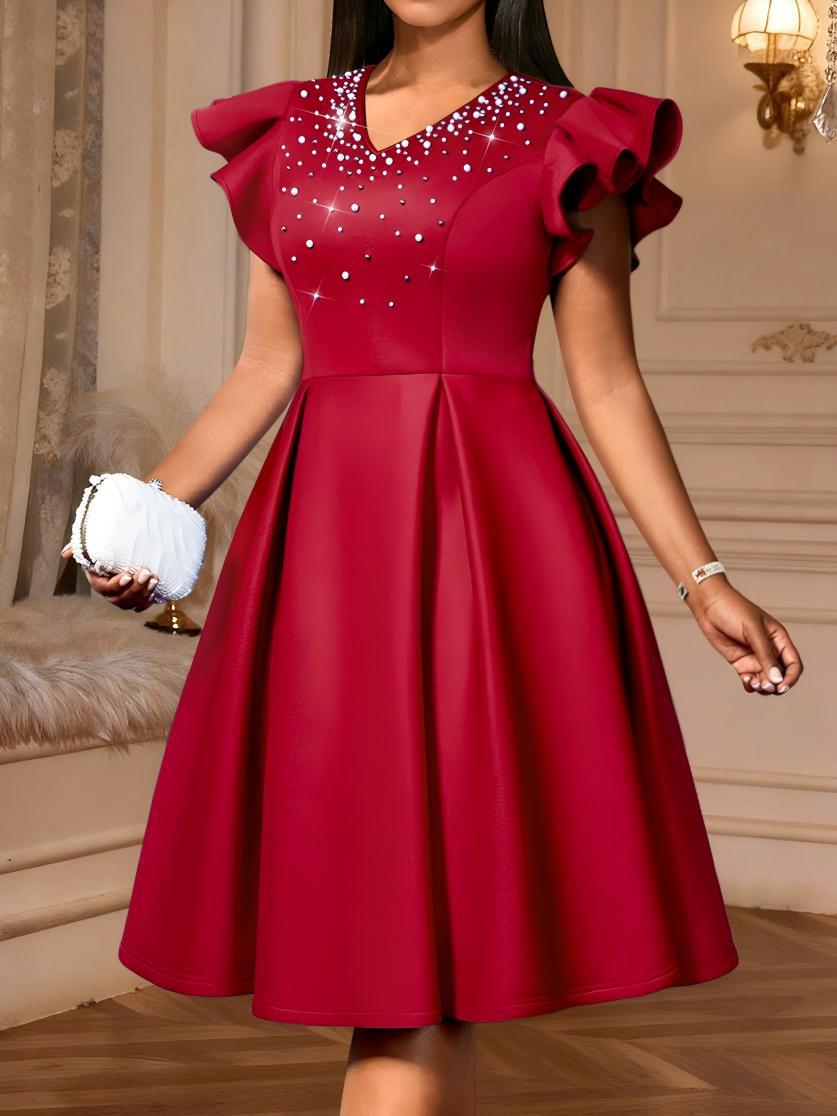 Women A-Line dress with shimmering pearls and voluminous sleeves StylebySassy