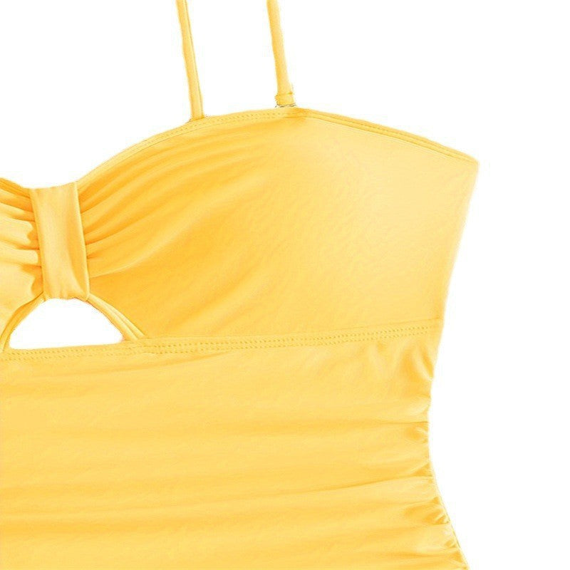 Women's one-piece swimsuit with sophisticated cut-out and gathering.