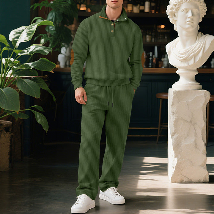 Men's fine ribbed sweater with half button placket, high stand-up collar, and contrasting suede elbow patches StylebySassy