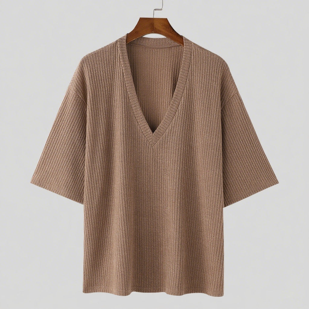 Women's oversized V-neck knit top with textured ribbed look and half-length sleeves StylebySassy