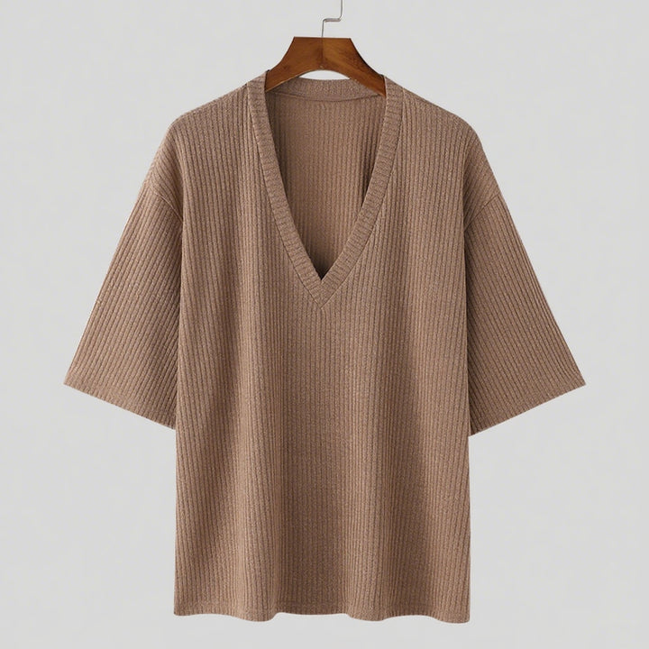 Women's oversized V-neck knit top with textured ribbed look and half-length sleeves StylebySassy