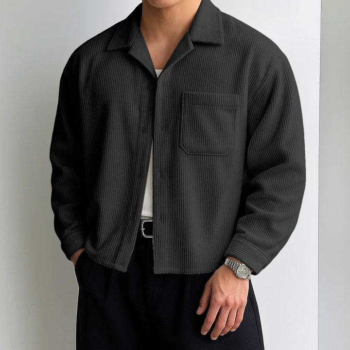 Men's ribbed long sleeve shirt with lapel collar, chest pocket, and relaxed fit StylebySassy
