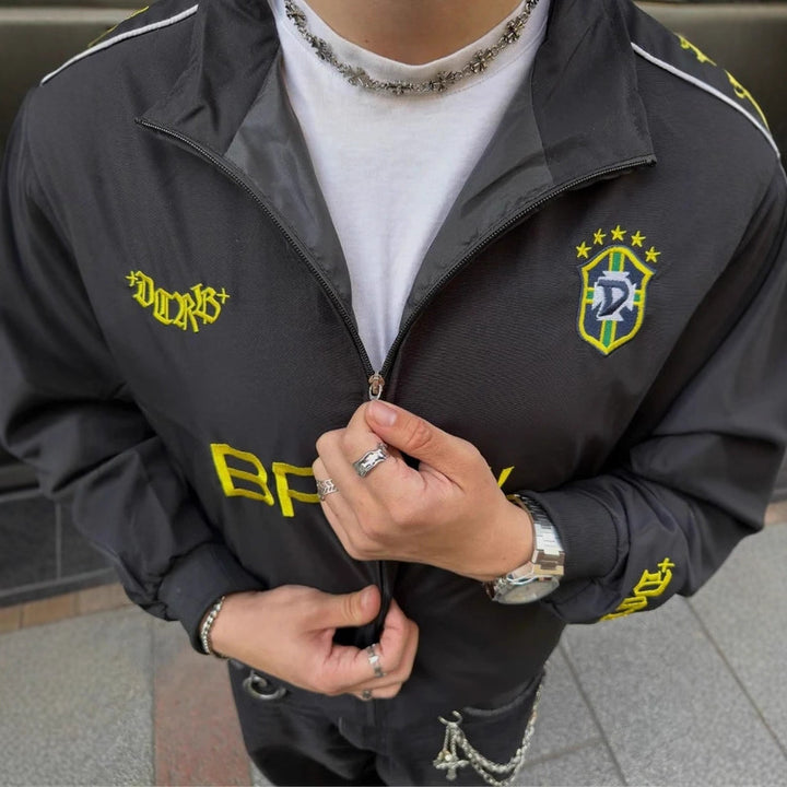 Unisex nan sporty retro training jacket with stand collar zipper chest emblem and Brazil lettering StylebySassy