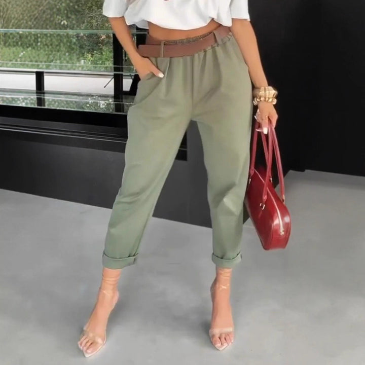 Women's high-waisted paperbag pants with gathered waistband, side pockets, and rolled hem StylebySassy