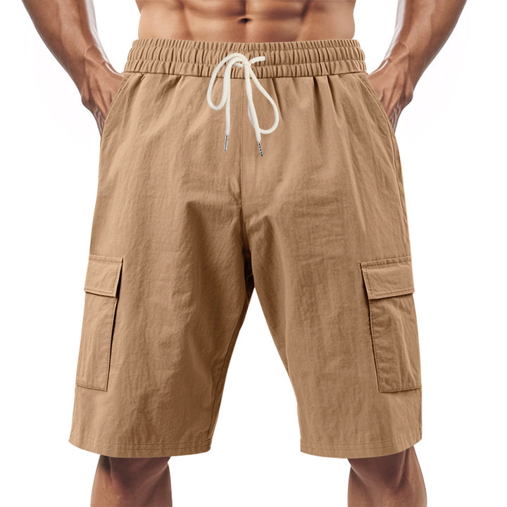 Men's technical cargo shorts with elastic drawstring waistband, secure flap pockets, and quick-drying functional material StylebySassy