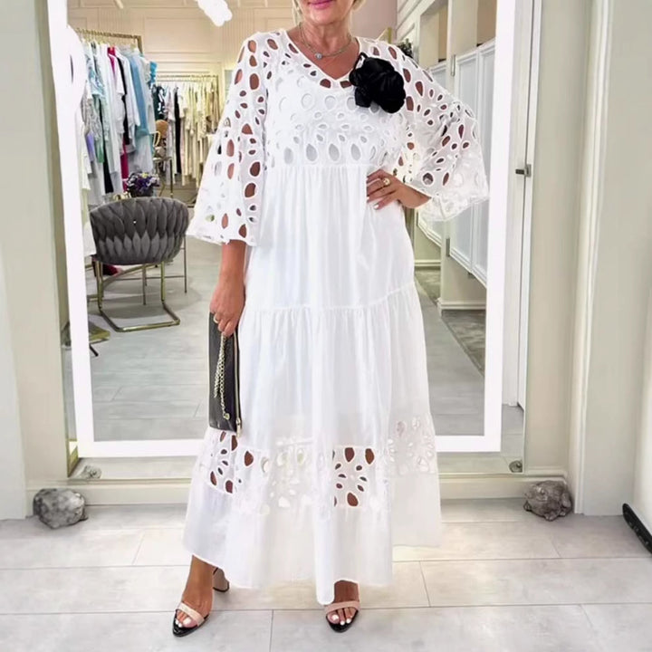 Women's maxi dress with openwork embroidery, V-neck, wide bell sleeves, and tiered hem StylebySassy