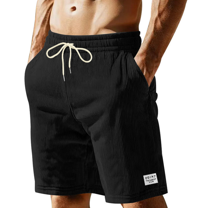 Men's knee-length lounge shorts in ribbed structure jersey with elastic drawstring waistband and patch pockets StylebySassy