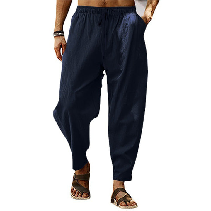 Men's relaxed summer slouch pants made of linen blend with elastic waistband and tapered ankle cuffs StylebySassy