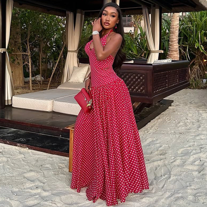 Ladies long halter dress with deep V-neck, tailored empire seam and flared layered skirt StylebySassy