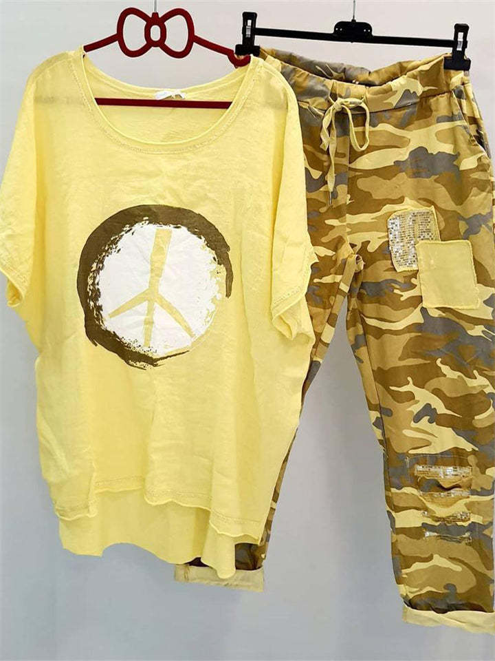 Women’s casual leisure two-piece with wide-cut linen look shirt, peace symbol and camouflage jog pants with patch details StylebySassy