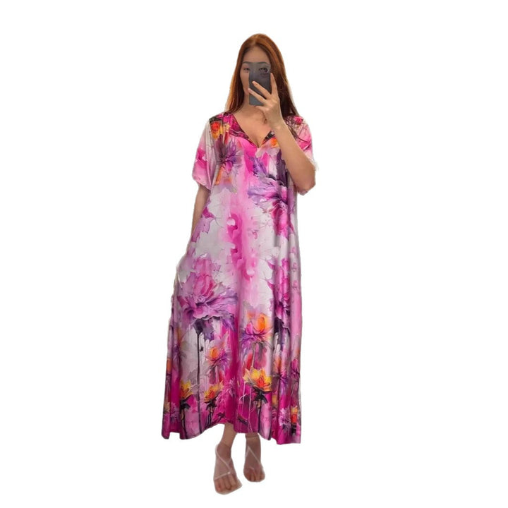Women flowing maxi kaftan dress with V-neck and large watercolor floral print StylebySassy