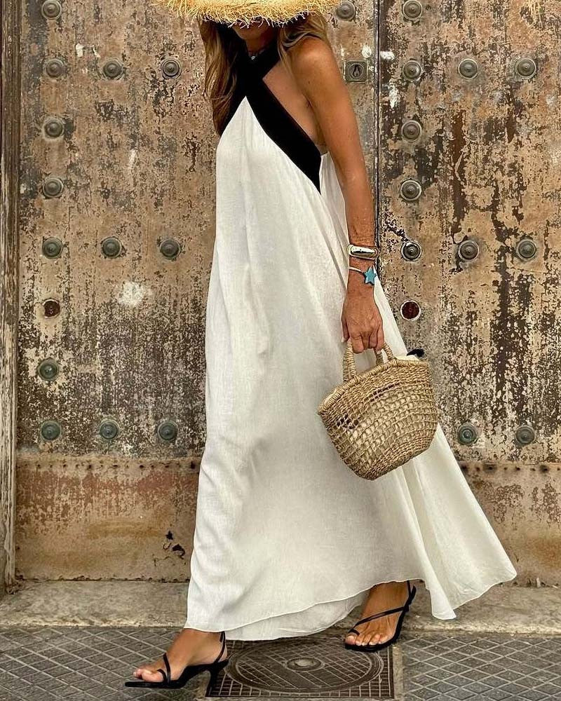 Women’s airy kaftan dress with crossed strap detail, breast yoke and wide fall StylebySassy