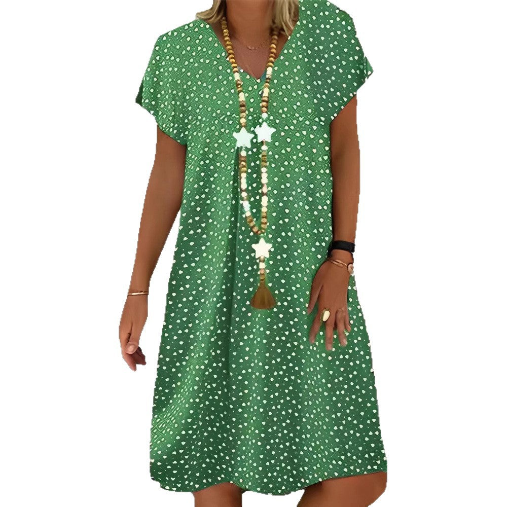 Ladies nan locker falling V-neck short dress with A-line cut, cap sleeves and all-over heart print StylebySassy