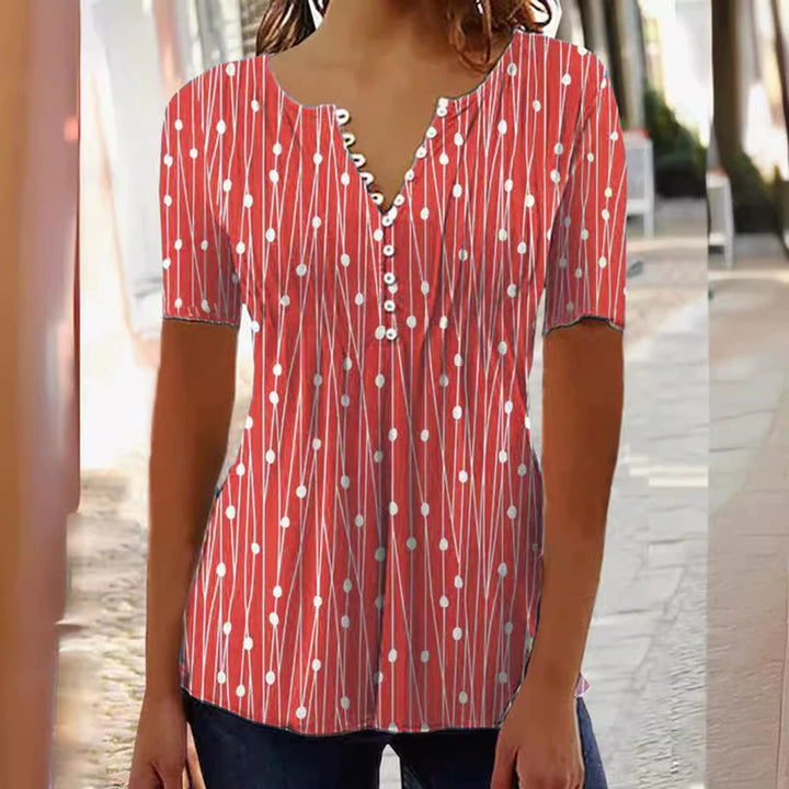 Women's lightweight tunic blouse with V-neck, decorative button placket, and empire gathering StylebySassy