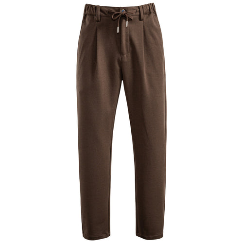 Men's pleated jogger-style trousers with drawstring, belt loops, and tapered cut StylebySassy