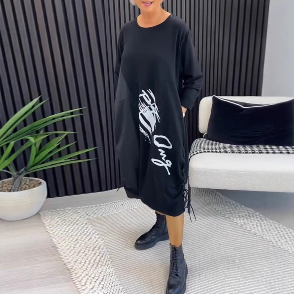 Women's casual jersey dress with side drawstring gathering, patch pockets and statement print StylebySassy