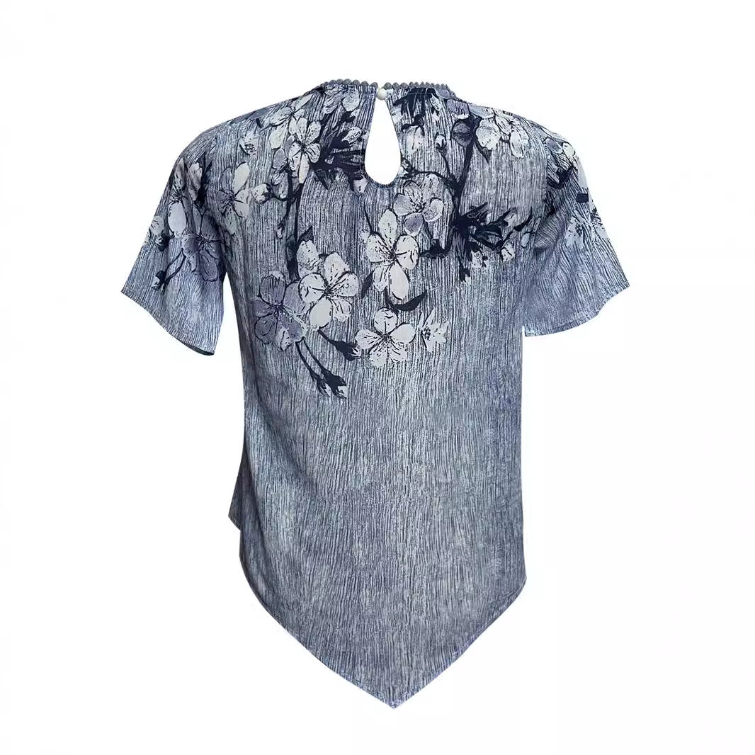 Women's two-layer blouse dress with asymmetrical tiered hem, floral print yoke, and wing sleeves StylebySassy