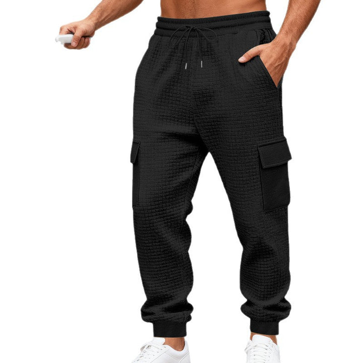 Men's waffle texture cargo pants in jogging style with flap pockets and elastic waistband StylebySassy