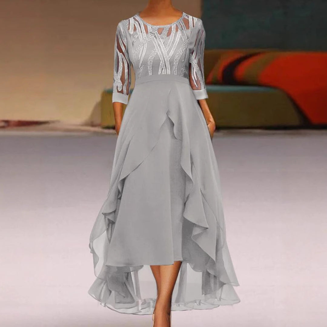 Women's elegant chiffon evening dress with embroidered tulle bodice, three-quarter sleeves, and asymmetric tiered hem StylebySassy