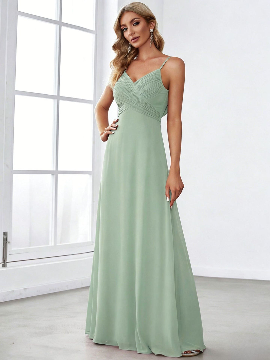 Ladies flowing chiffon evening dress with crossed draping, empire waist and fine spaghetti straps StylebySassy