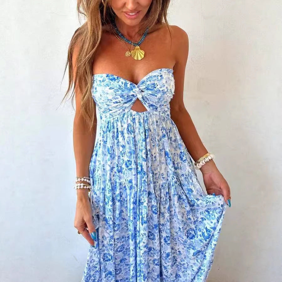 Ladies' strapless twisted bustier maxi dress with cut-out and multi-layered tiered skirt in lightweight crinkle quality StylebySassy