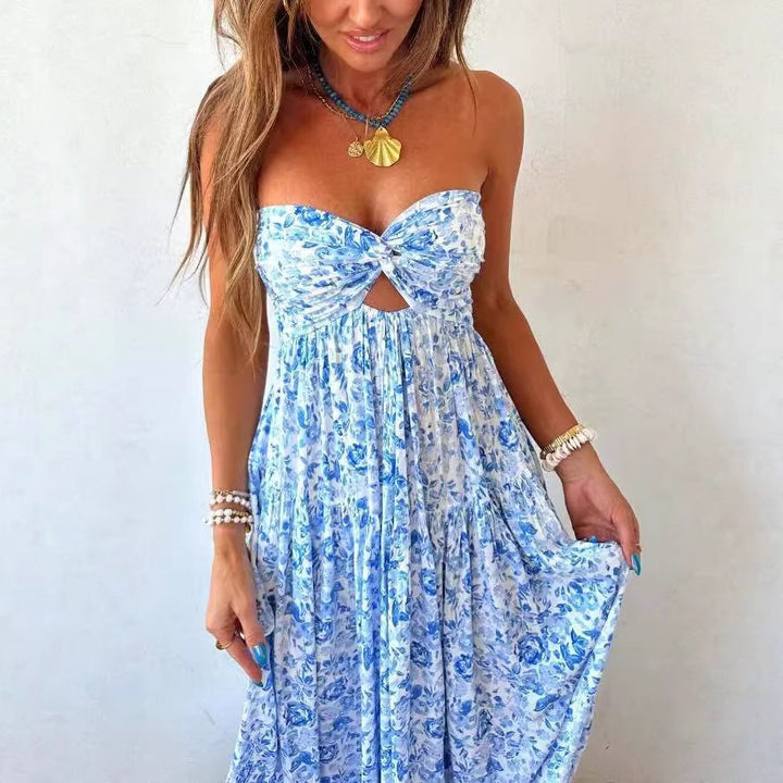 Ladies' strapless twisted bustier maxi dress with cut-out and multi-layered tiered skirt in lightweight crinkle quality StylebySassy