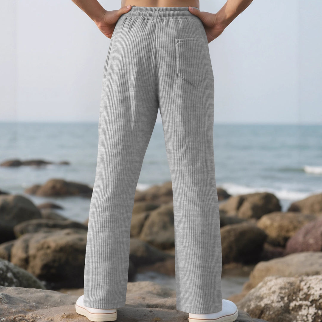 Men's straight cut corduroy velour pants with drawstring waistband, metal drawstring ends, and deep side pockets StylebySassy
