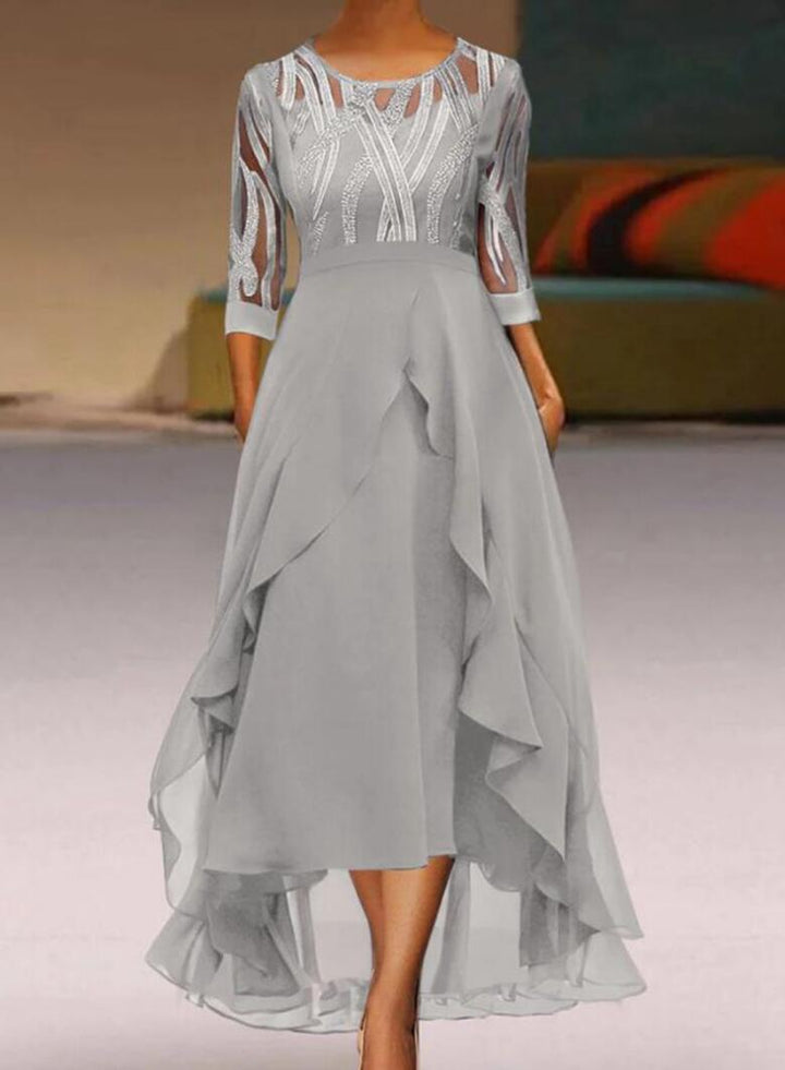 Women's elegant chiffon evening dress with embroidered tulle bodice, three-quarter sleeves, and asymmetric tiered hem StylebySassy