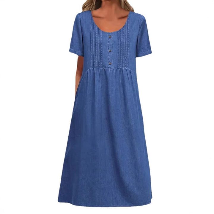 Ladies' knee-length dress in denim look with round neckline, chest piping and side inset pockets StylebySassy