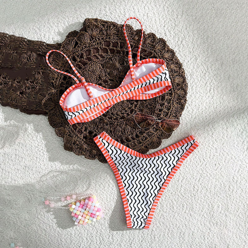 Women's bikini set with textured wave pattern and sporty strap design StylebySassy