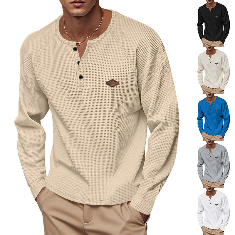 Men's structured long-sleeve shirt with short button placket, raglan sleeves, and subtle logo application StylebySassy