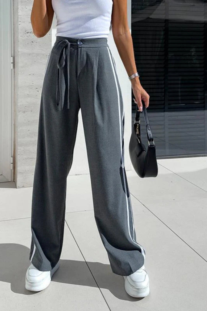 Women high-waisted wide leisure pants with sporty side stripe and tie belt StylebySassy