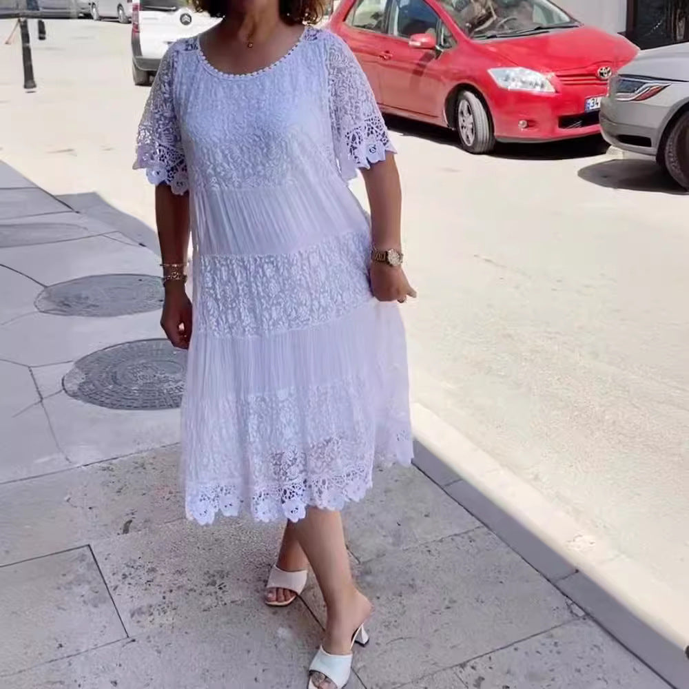 Women's midi dress with lace tiers, pleated inserts and short trumpet sleeves StylebySassy