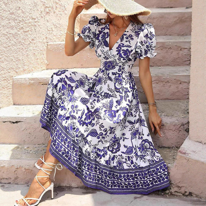 Women's tailored Boho maxi dress with wrap look V-neck puff sleeves and border tiered skirt StylebySassy