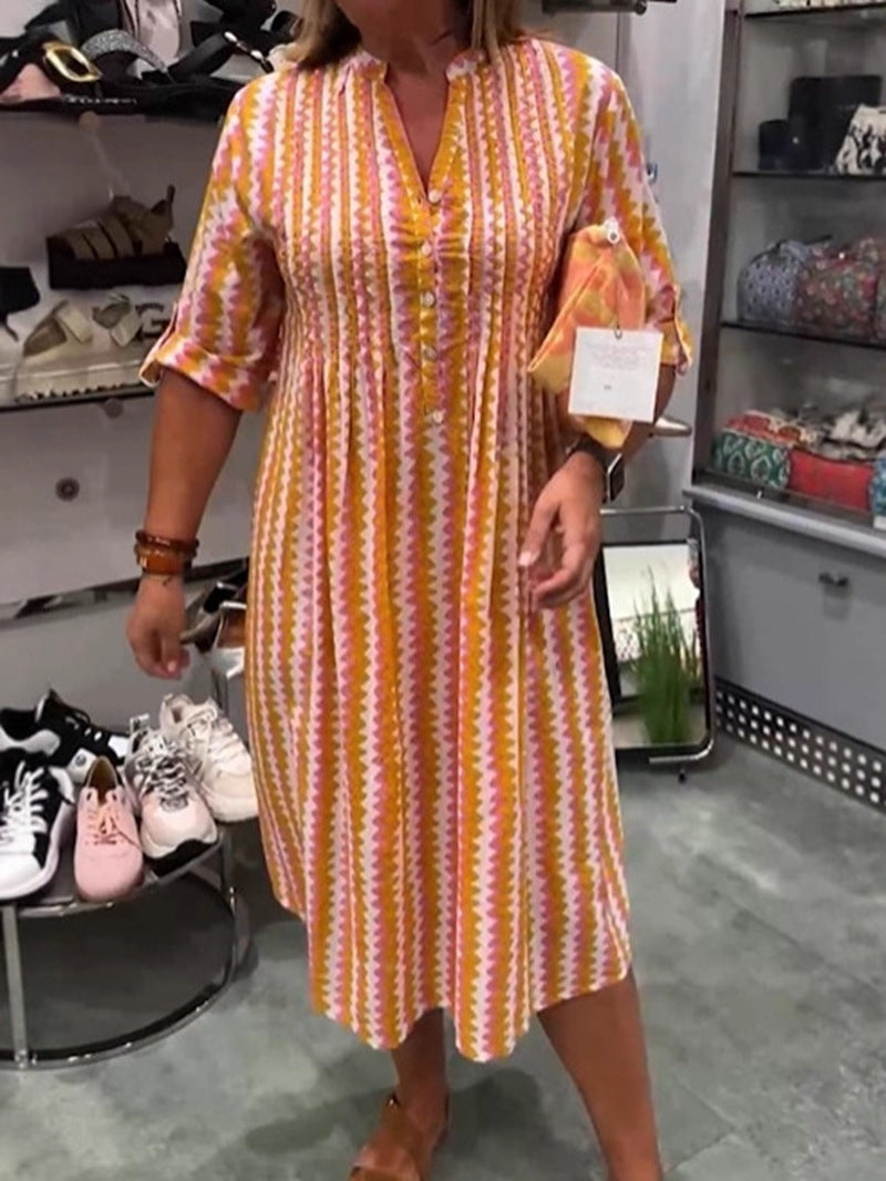 Ladies nan midi dress with underbust seam, V-neck, button placket and roll-up three-quarter sleeves StylebySassy