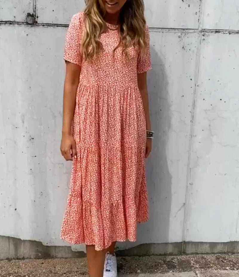 Women's floral crinkled midi dress with gathered empire waist, short sleeves, and tiered ruffle skirt StylebySassy