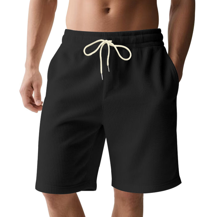 Men's knee-length Bermuda shorts with elastic waistband, drawstring, and side pockets StylebySassy