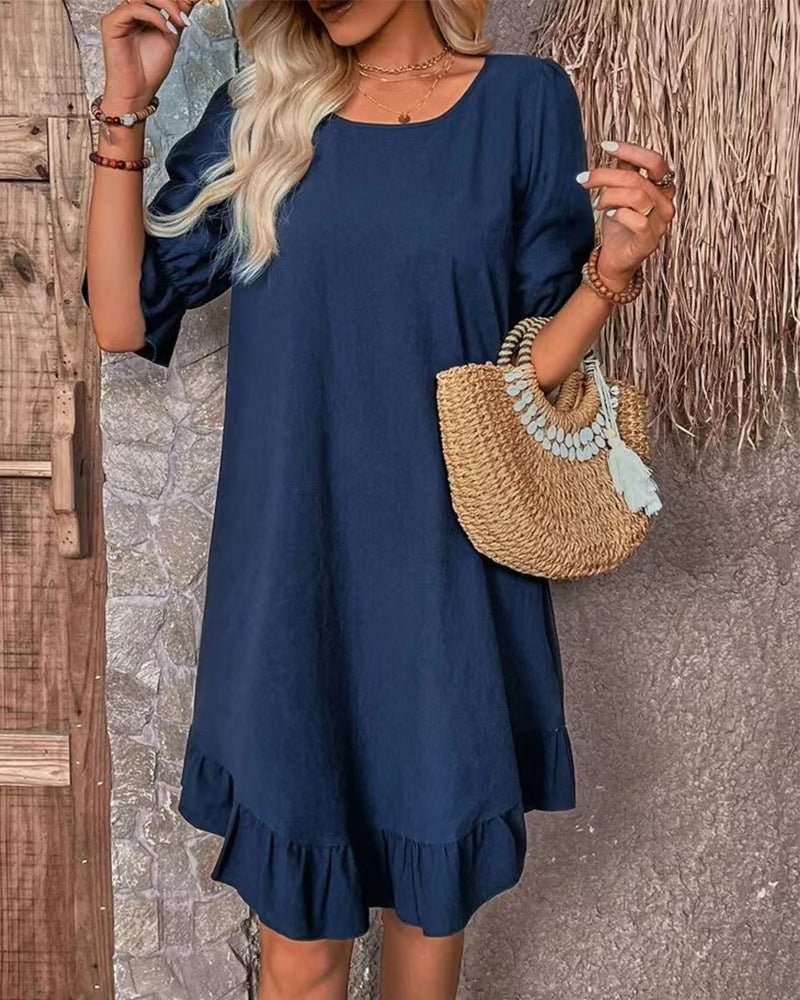 Women's lightweight A-line dress with ruffle hem and three-quarter sleeves made of linen blend StylebySassy