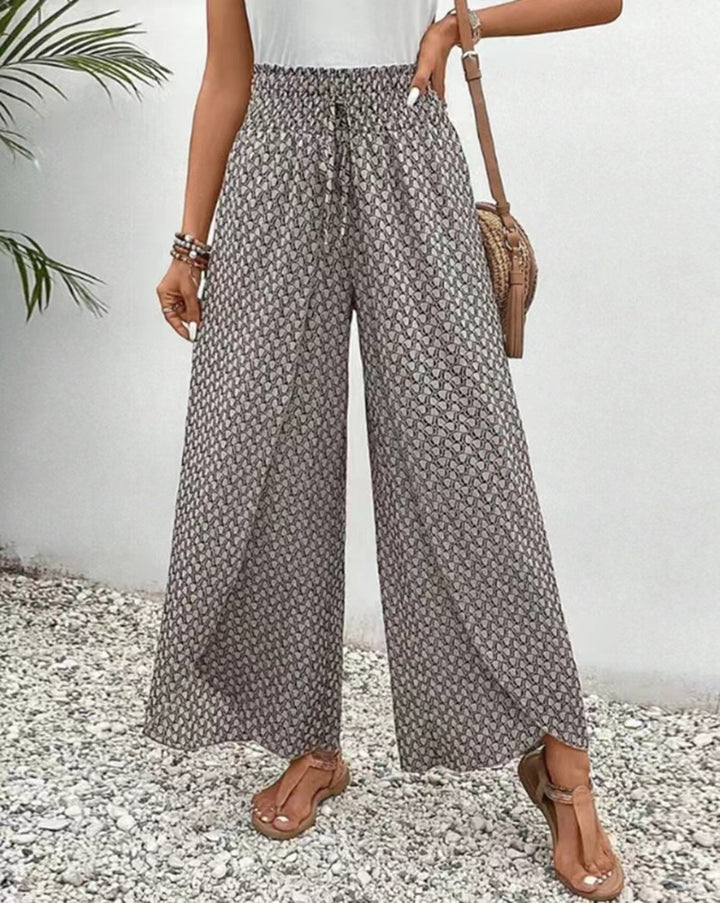 Women's loose summer pants with smocked elastic waistband and palazzo silhouette StylebySassy