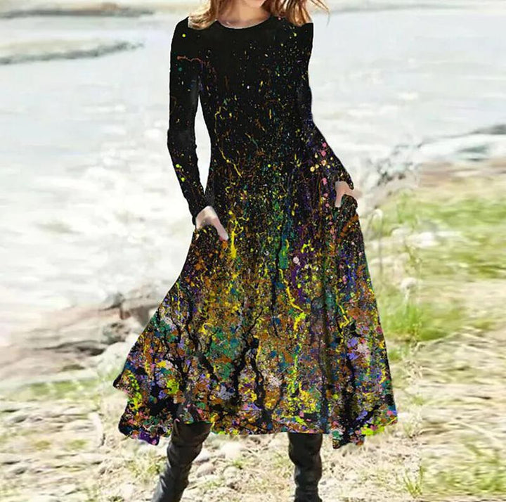 Women's A-line midi dress with abstract spray pattern, round neckline, long sleeves and side pockets StylebySassy