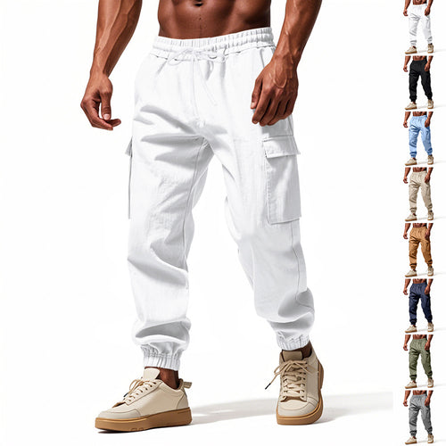 Men's tapered joggers in utilitarian style with elastic waistband, drawstring, and flap pockets StylebySassy