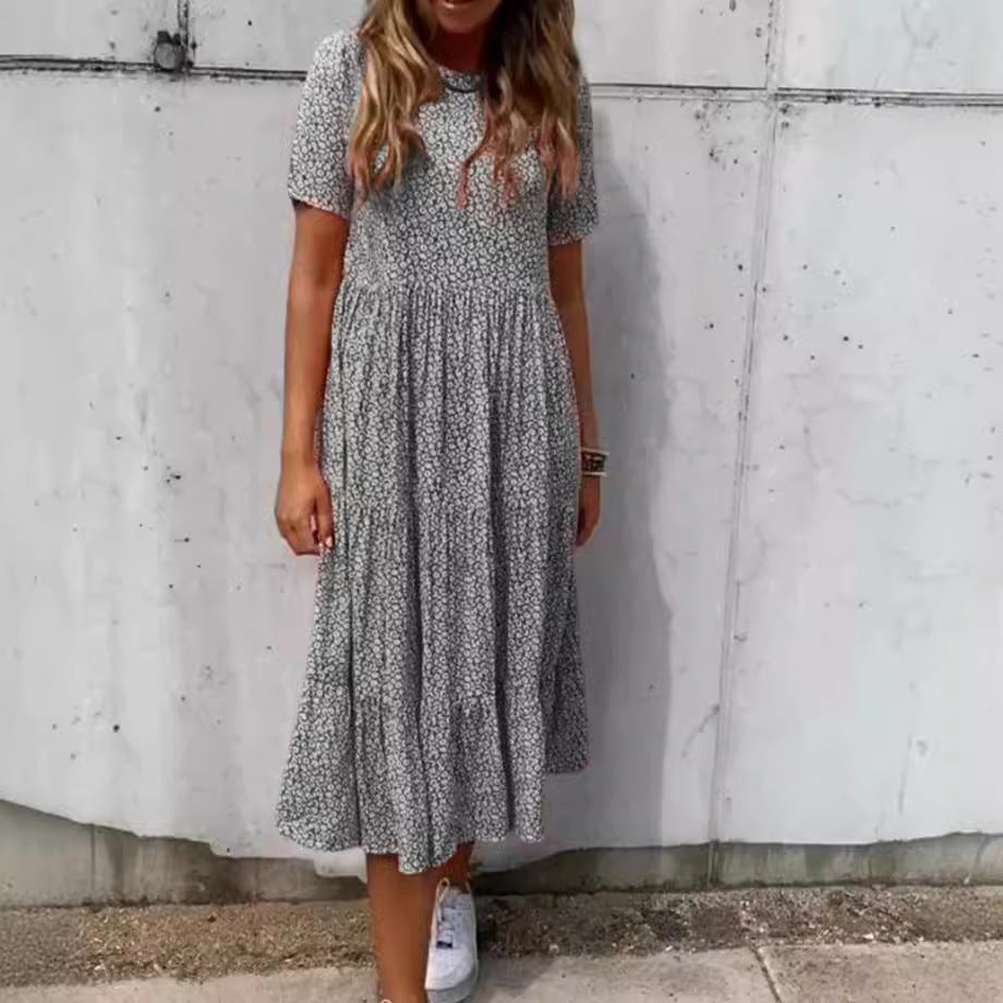 Women's light midi dress with gathered waist, short sleeves, and multilayered tiered skirt StylebySassy