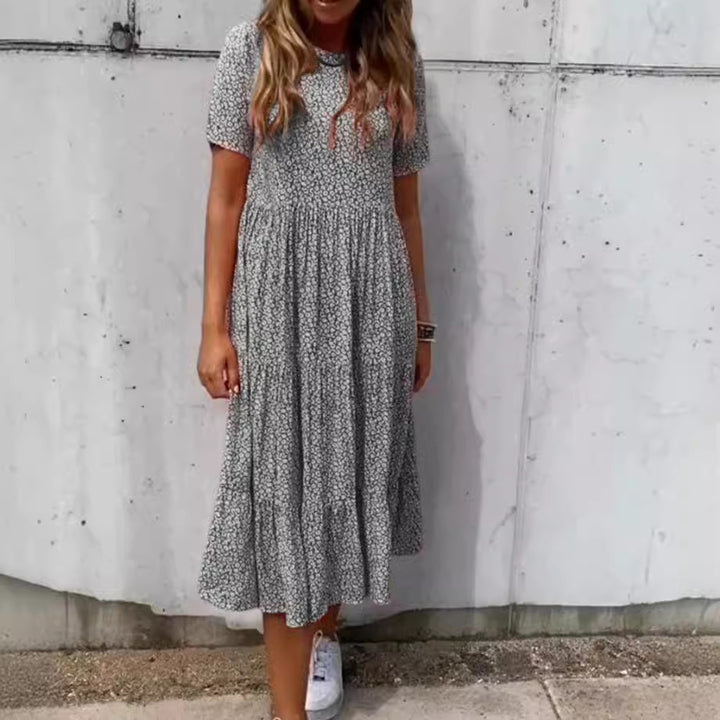 Women's light midi dress with gathered waist, short sleeves, and multilayered tiered skirt StylebySassy