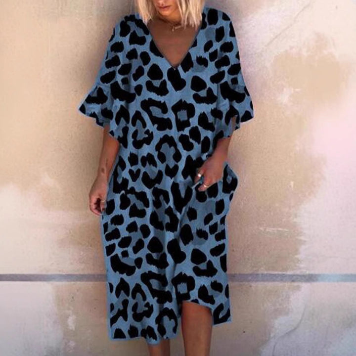 Ladies' casual midi dress in tunic style with V-neck, ruffled sleeves, and side pockets StylebySassy
