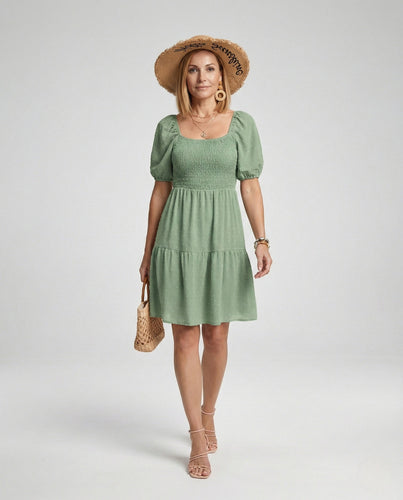 Women's leisure dress with smocked bodice