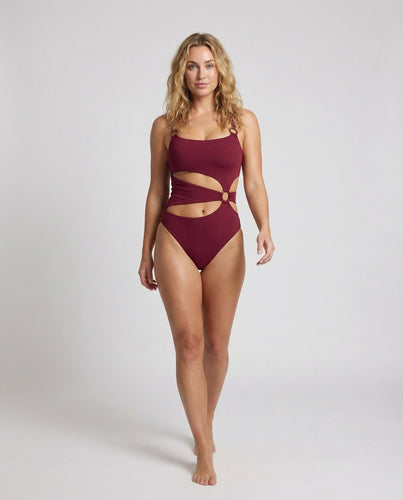 Ladies swimsuit sculptural side cutouts
