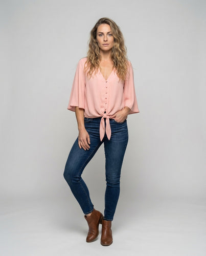 Women's casual blouse shirt with wing sleeves.